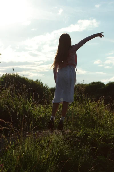 Klein meisje silhouet — Stockfoto