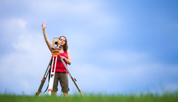 Young land surveyor at work — Stock Photo, Image