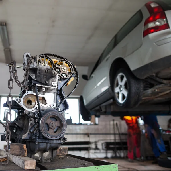 Inside a garage - changing wheels and tires — Stock Photo, Image