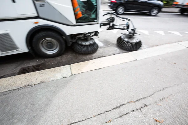 Detail of a street sweeper machine car cleaning the road — Stock Photo, Image