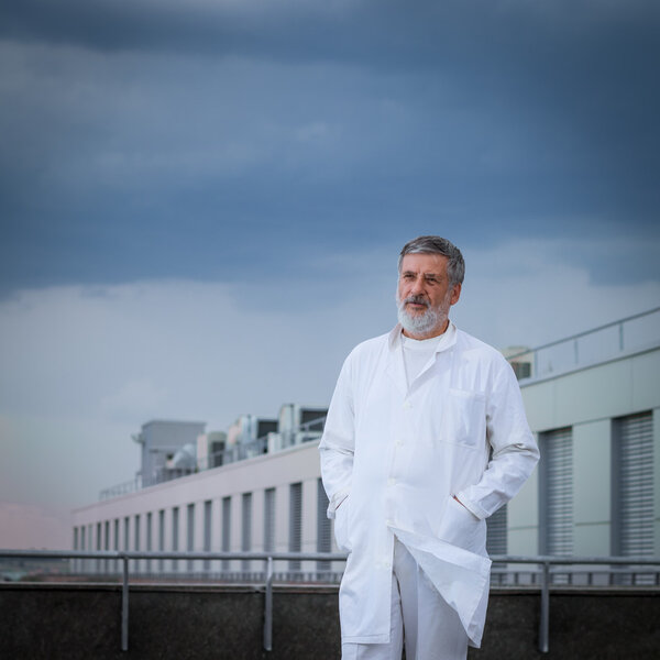 Renowned scientist,doctor standing on the roof of the research center