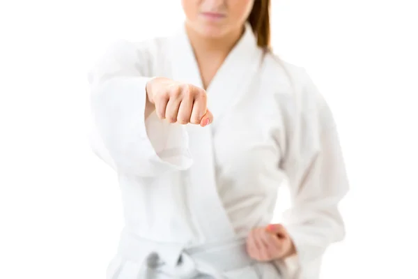 Woman performing karate moves — Stock Photo, Image