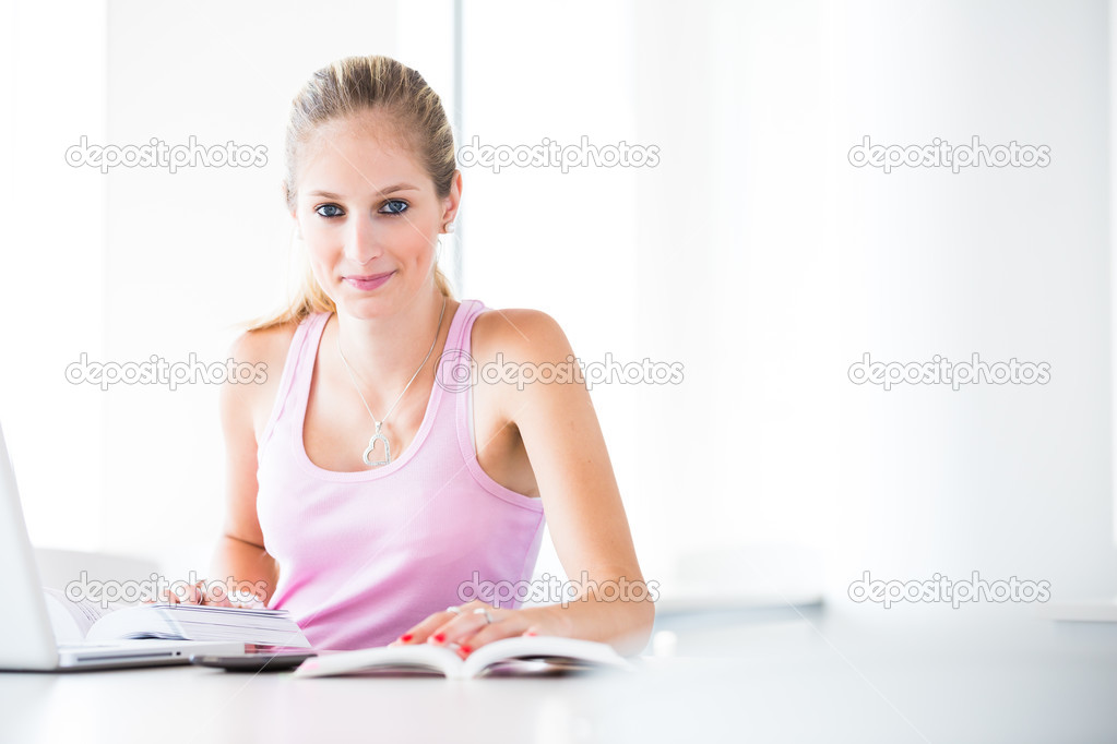 On campus student with books