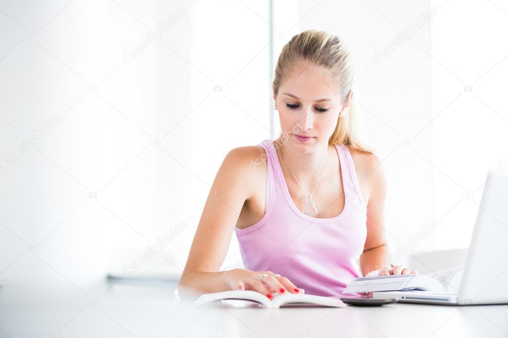 On campus student with books