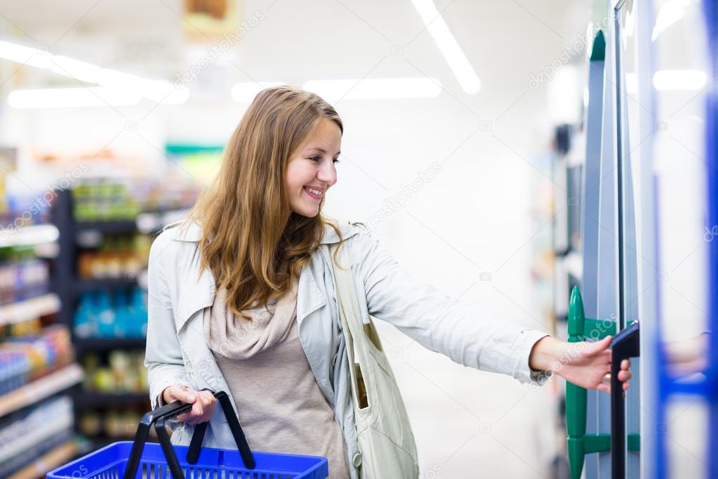 Woman shopping in a grocery store, supermarket