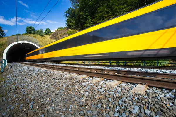 Fast train passing through a tunnel — Stock Photo, Image