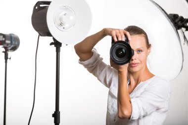 Photographer with digital camera - DSLR clipart