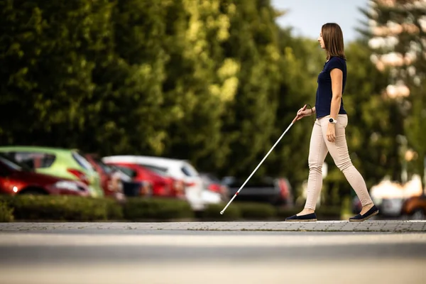 Blind Woman Walking City Streets Using Her White Cane Navigate — Stock Photo, Image