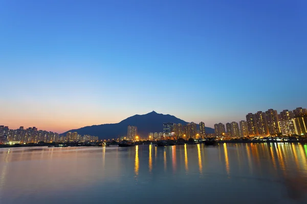 Hong kong şehir merkezinde, tuen mun gün batımında. — Stok fotoğraf