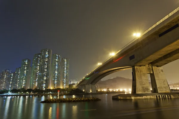 Hong kong downtown bron på natten — Stockfoto