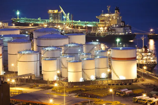 Oil tanks scene at night — Stock Photo, Image