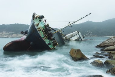 Wreck on the coast  clipart