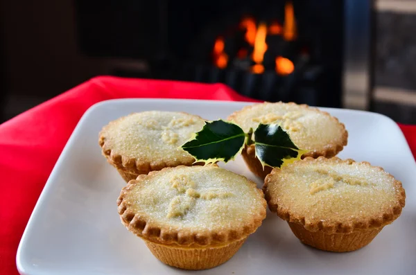 Christmas mince pies by the fire — Stock Photo, Image