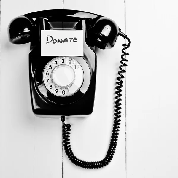 Retro-Telefon mit Geldschein für wohltätige Zwecke — Stockfoto
