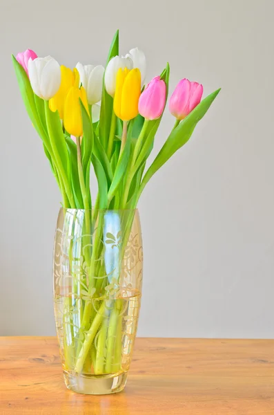 Spring tulips in a vase — Stock Photo, Image