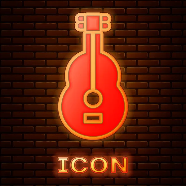 Gloeiende neon Spaanse gitaar icoon geïsoleerd op bakstenen muur achtergrond. Akoestische gitaar. Strijkmuziekinstrument. Vector — Stockvector