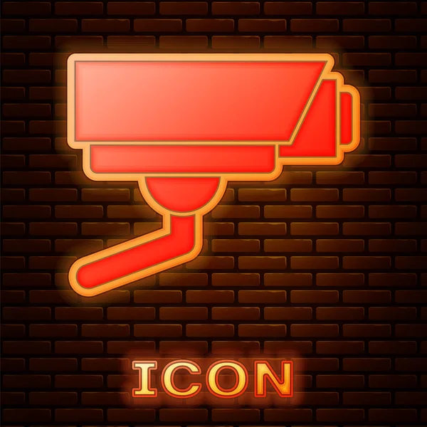 Zářící ikona neonové bezpečnostní kamery izolované na pozadí cihlové stěny. Vektor — Stockový vektor