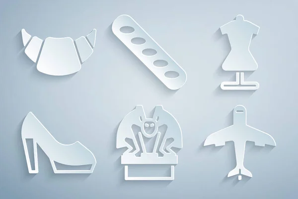 Gargoyle auf Sockel, Schaufensterpuppe, Frauenschuh, Flugzeug, französisches Baguette-Brot und Croissant-Ikone. Vektor — Stockvektor