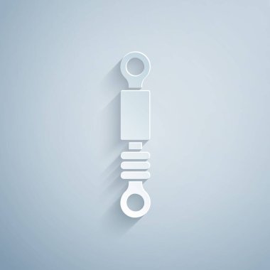 Kağıt kesiği. Gri arkaplanda şok emici simgesi var. Kağıt sanatı tarzı. Vektör.