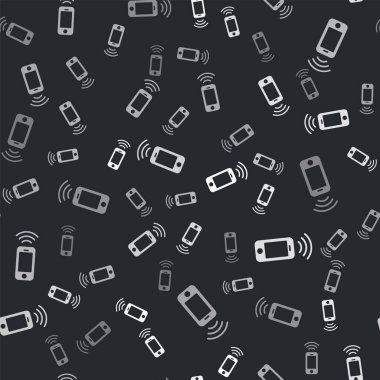 Gri kablosuz akıllı telefon simgesi siyah arkaplanda izole edilmiş. Vektör