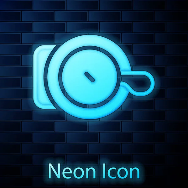 Zářící neon Kolo zvonek ikona izolované na cihlové zdi pozadí. Vektor — Stockový vektor
