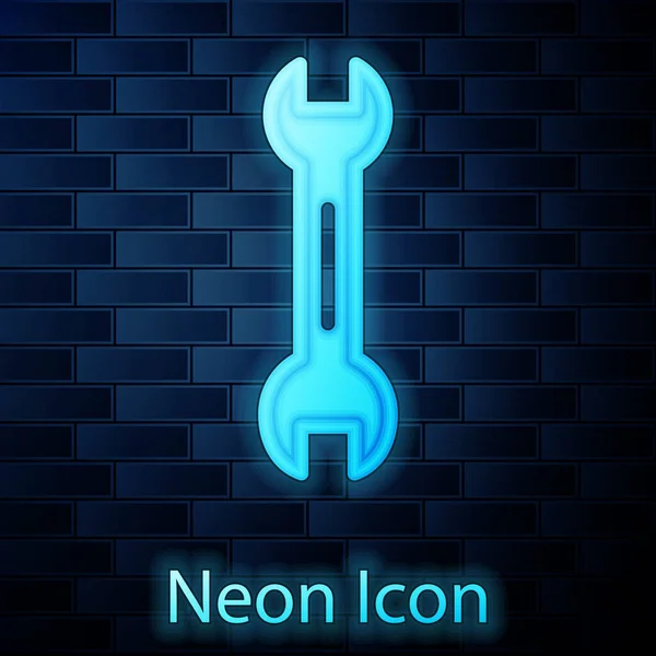 Glowing neon Wrench spanner icon isolated on brick wall background. Vector — Stock Vector