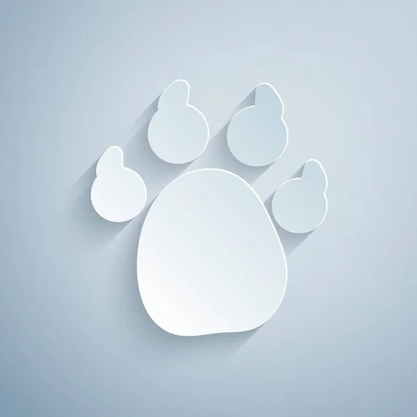Papel corte ícone de impressão Paw isolado no fundo cinza. Impressão de pata de cão ou gato. Pista animal. Estilo de arte de papel. Vetor — Vetor de Stock