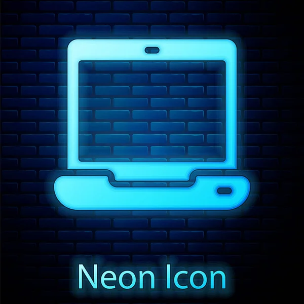 Icono brillante de neón portátil aislado en el fondo de la pared de ladrillo. Computadora portátil con pantalla vacía. Vector — Vector de stock