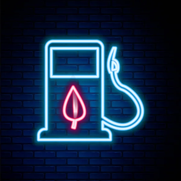 Glowing neon line Bio fuel concept with fueling nozzle and leaf icon isolated on brick wall background. Gas station with leaves. Eco refueling. Colorful outline concept. Vector — Vettoriale Stock
