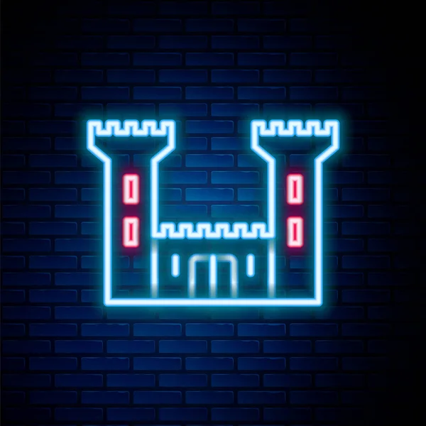 Glowing neon line Castle icon isolated on brick wall background. Fortress sign. Colorful outline concept. Vector — стоковый вектор