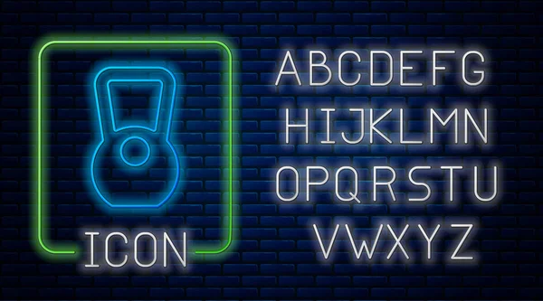 Glowing neon Kettlebell icon isolated on brick wall background. Sport equipment. Neon light alphabet. Vector — Stockvector
