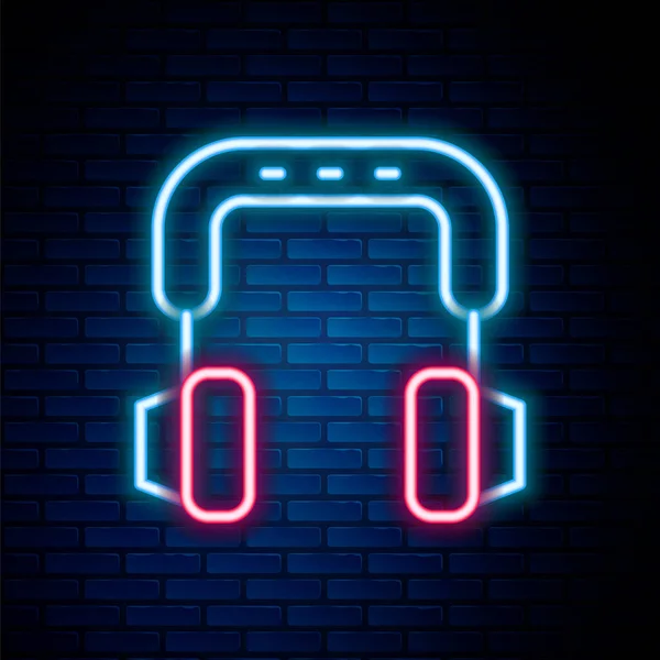 Icono Auriculares Línea Neón Brillante Aislado Fondo Pared Ladrillo Auriculares — Vector de stock