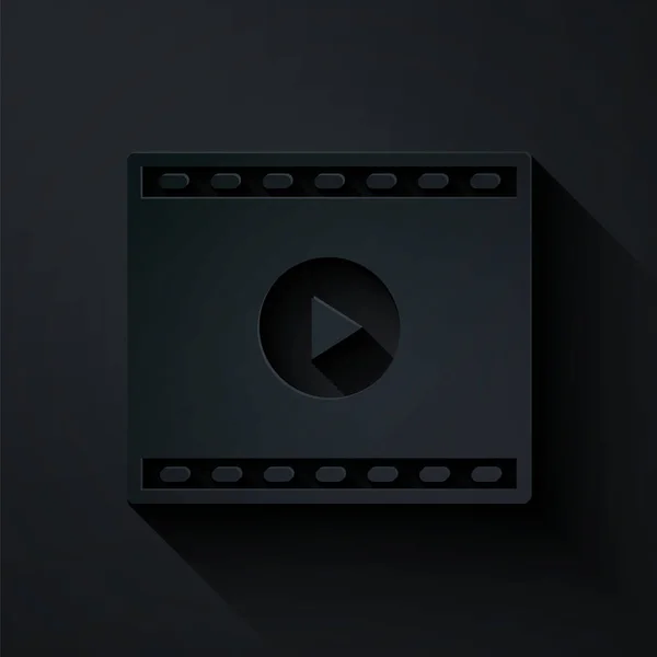 Paper cut Icône vidéo de lecture en ligne isolée sur fond noir. Bande de film avec panneau de jeu. Style art du papier. Vecteur — Image vectorielle