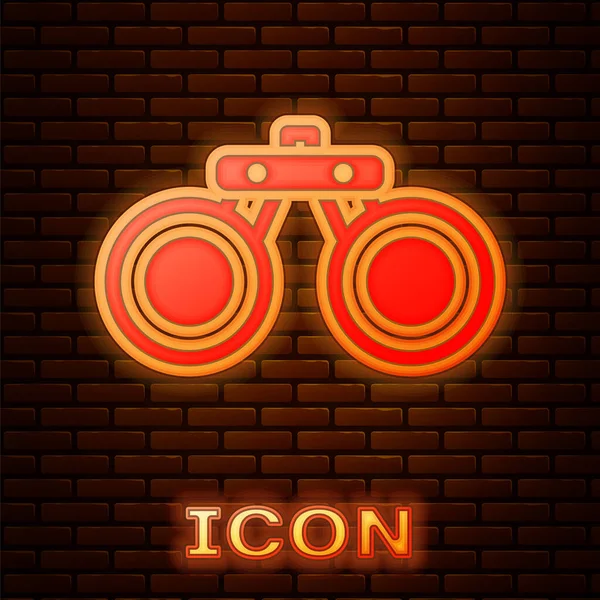 Gloeiende Neon Verrekijker Pictogram Geïsoleerd Baksteen Muur Achtergrond Zoek Software — Stockvector