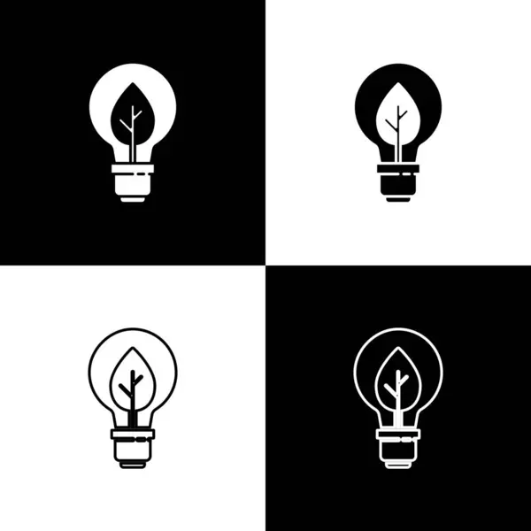 Set Light bulb with leaf icon isolated on black and white background. Eco energy concept. Alternative energy concept. Vector — Stock Vector