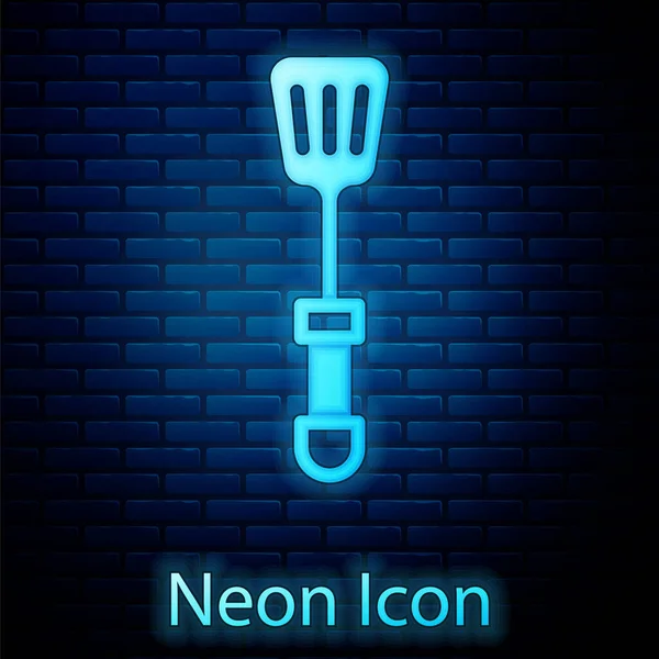Glödande neon Spatula ikon isolerad på tegel vägg bakgrund. Köksspatel ikonen. Grill spatel tecken. Grill och grill verktyg. Vektor — Stock vektor