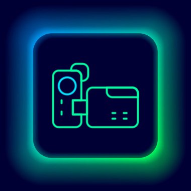 Parlayan neon hattı sinema kamerası simgesi siyah arkaplanda izole edildi. Video kamera. Film tabelası. Film projektörü. Renkli taslak konsepti. Vektör