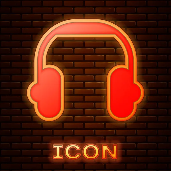 Icono Auriculares Neón Brillante Aislado Fondo Pared Ladrillo Auriculares Concepto — Vector de stock