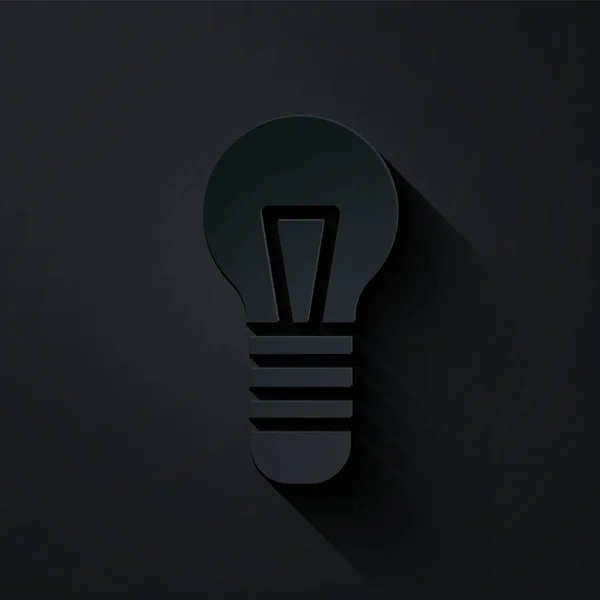ペーパーカット黒の背景にアイコンの概念で電球を切り取ります エネルギーとアイデアのシンボル インスピレーションの概念 紙のアートスタイル ベクトル — ストックベクタ
