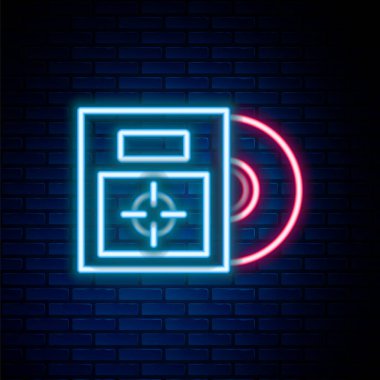 Glowing neon line CD or DVD disk in box icon isolated on brick wall background. Compact disc sign. Colorful outline concept. Vector.