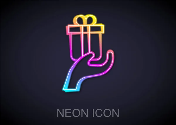 Glödande Neon Line Gåva Ikon Isolerad Svart Bakgrund Gåva Handen — Stock vektor