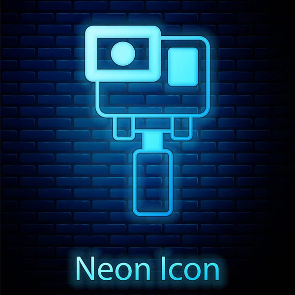 Glowing Neon Action Extreme Camera Icon Isolated Brick Wall Background — Stock Vector