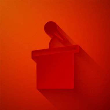 Kağıt kesme sahnesi veya münazara kürsüsü ikonu kırmızı arkaplanda izole edilmiş. Konferans konuşma tribünü. Kağıt sanatı tarzı. Vektör.