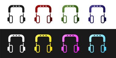 Kulaklık simgesini siyah beyaz arkaplana ayır. Kulaklıklar. Müzik, hizmet, iletişim ve operatör konsepti. Vektör.