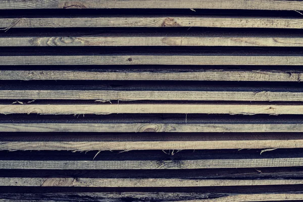 Horizontaal liggen houten oude bars — Stockfoto