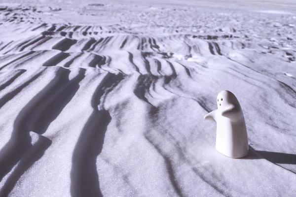 Little lonely white man stay on snow — Stock Photo, Image