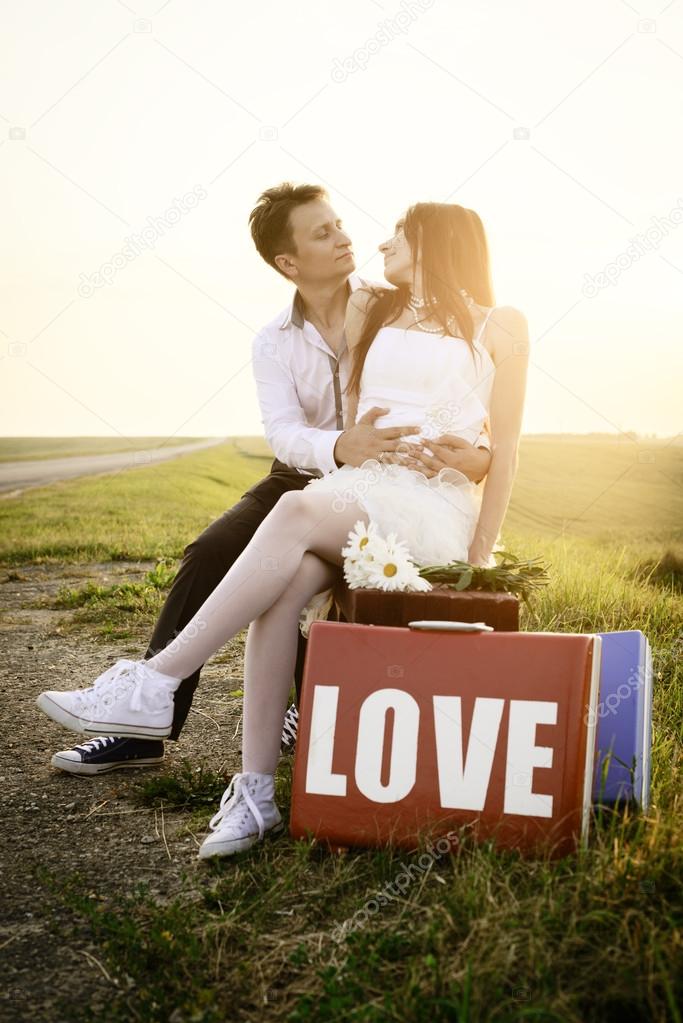 wedding of unusual couple at bus stop