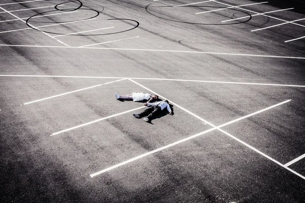 Loving young pair at wedding on an empty autoparking — Stock Photo, Image