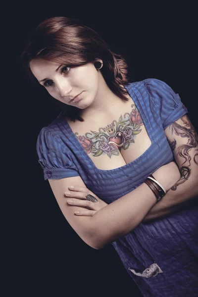 Beautiful woman with tattoo in black background — Stock Photo, Image