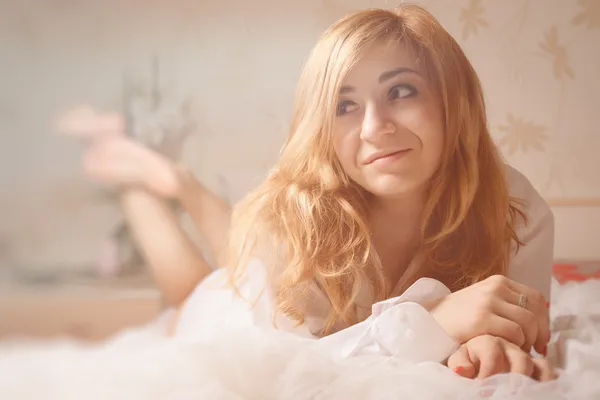 Beautiful romantic woman in morning bed — Stock Photo, Image